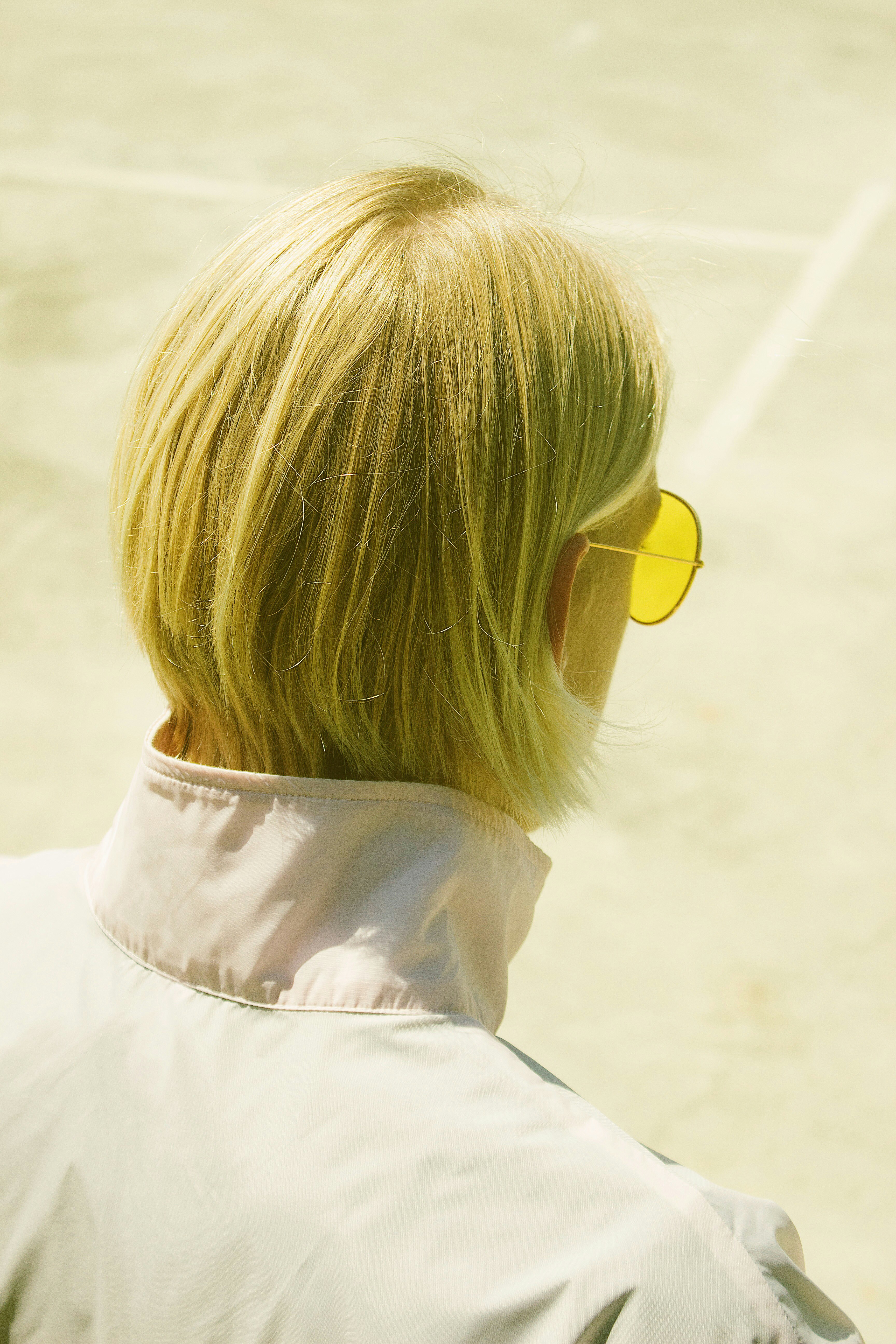 person wearing yellow sunglasses